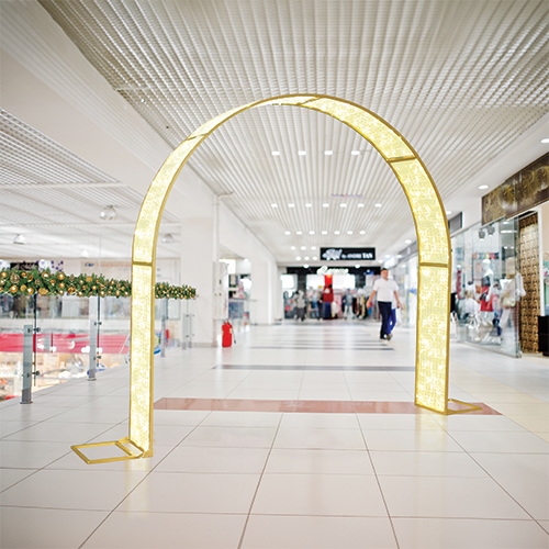 Dekra-Lite 8.2' Lorca Arch in a shopping center